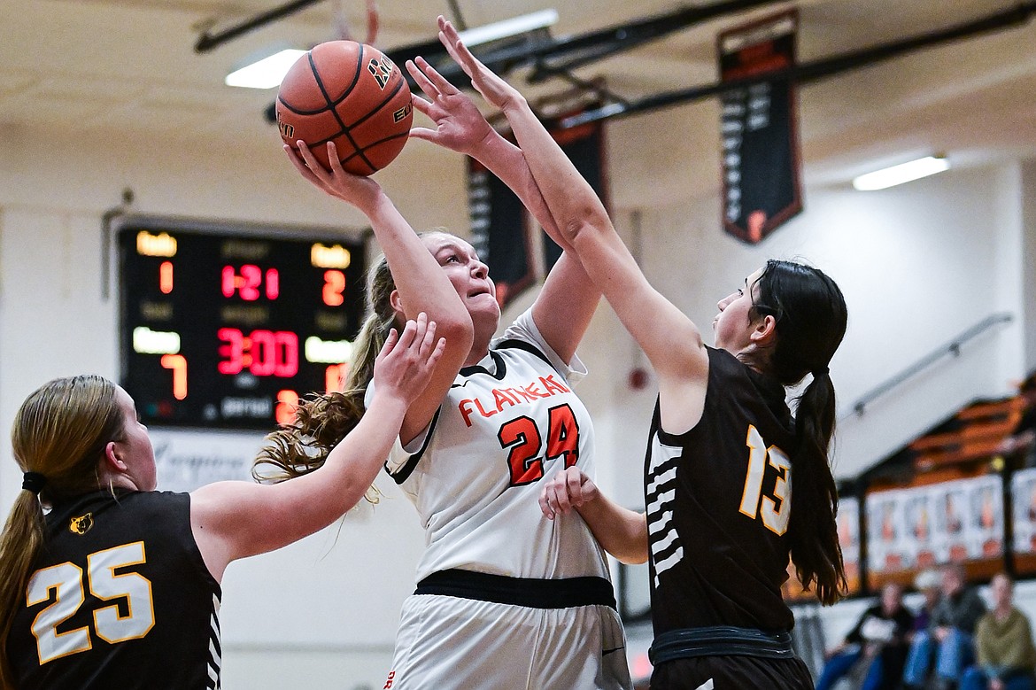 Flathead's Mattie Thompson (24) looks to shoot in the second quarter against Helena Capital at Flathead High School on Friday, Jan. 10. (Casey Kreider/Daily Inter Lake)