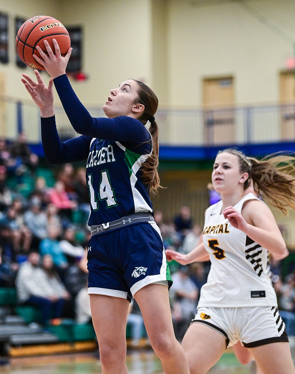 Glacier's Karley Allen (14) heads to the bucket for a basket in the first quarter against Helena Capital at Glacier High School on Saturday, Jan. 11. (Casey Kreider/Daily Inter Lake)