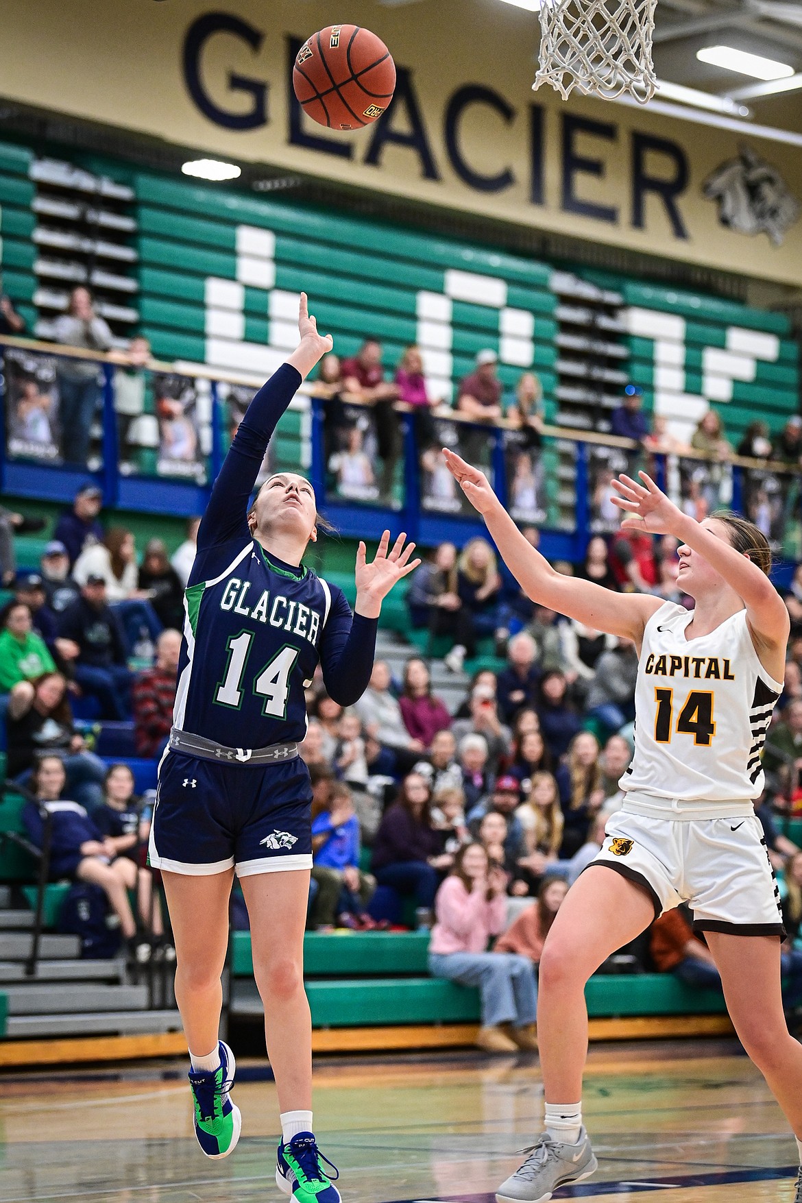 Glacier's Karley Allen (14) drives to the basket in the second quarter against Helena Capital at Glacier High School on Saturday, Jan. 11. (Casey Kreider/Daily Inter Lake)