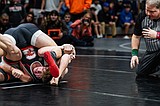 PREP WRESTLING: Trojans win fight, claim River City title