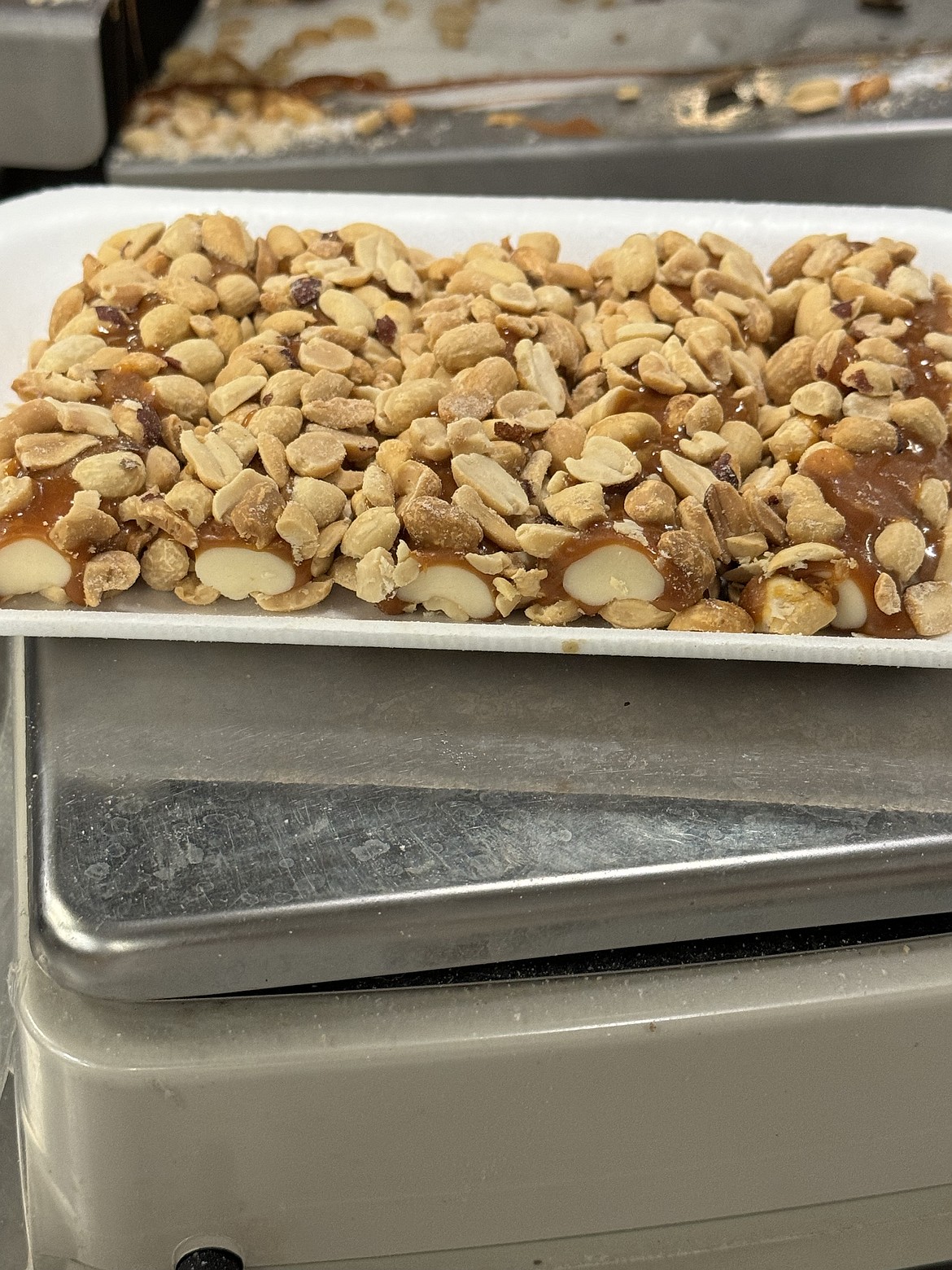 Genius Gourmet is on a roll: The North Idaho company's new Nut Roll Bar is pictured here as it is processed at a manufacturing facility.