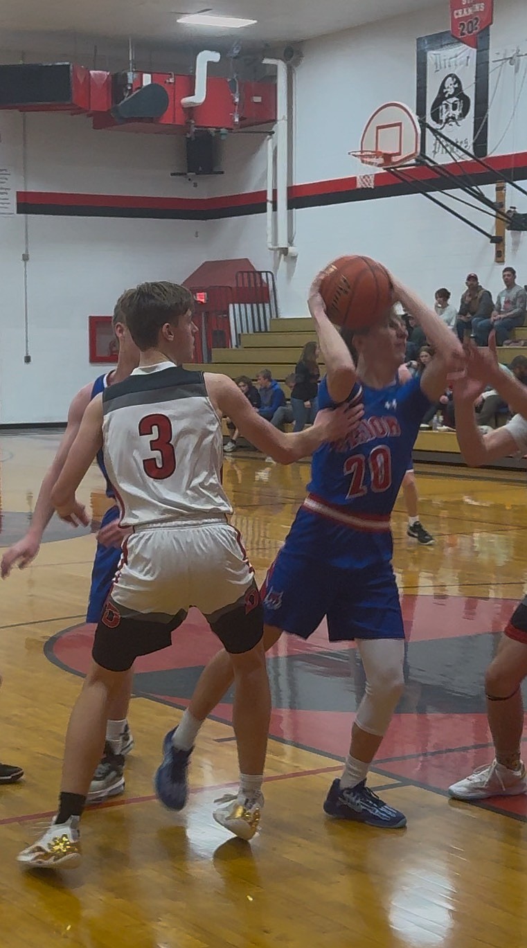 Bobcats guard/forward Phin Cataldo looks to score against the Darby Tigers this past Friday night in Darby. (Courtesy photo)