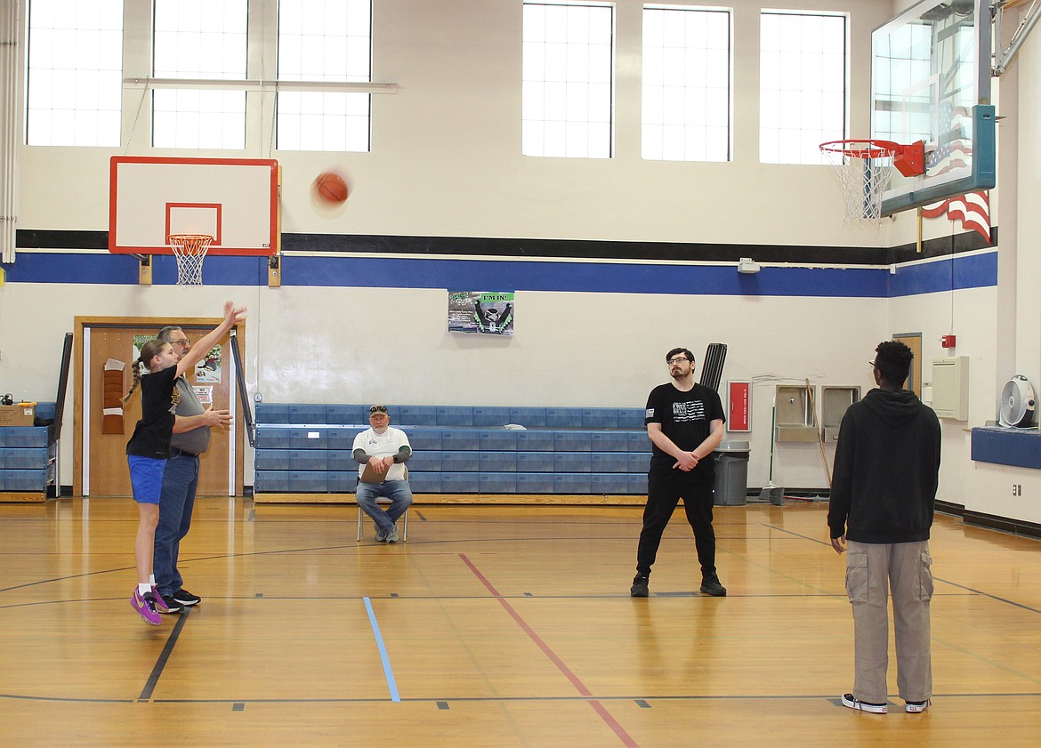 A young hopeful takes a free throw at the Elks Hoop Shoot in Moses Lake Saturday. The winners will go on to compete at the district competition in February, also to be held in Moses Lake.