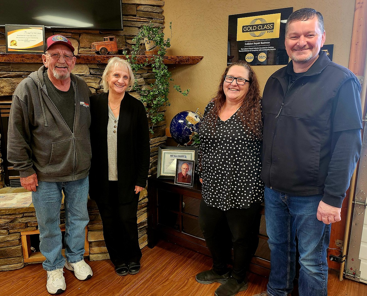 From left, Rob and Tracy Christopherson with new owners Jennifer and Mark Ferguson at Scott Shawver’s Auto Body and RV.