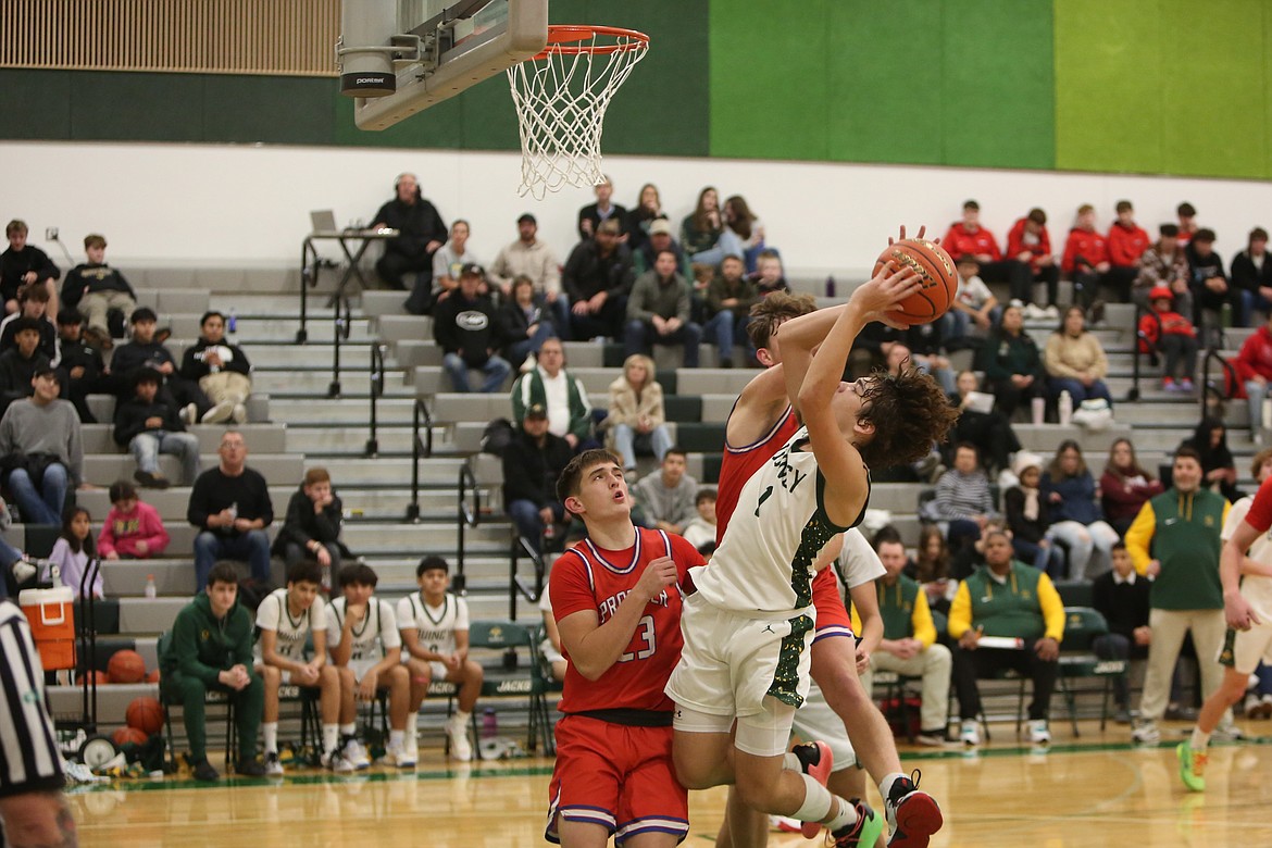 Quincy junior Pierce Bierlink, in white, scored 43 points during a 69-67 win over Toppenish on Jan. 8.