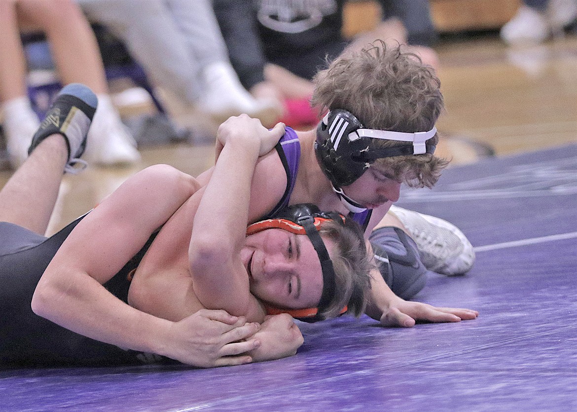 Polson's Levi Atkins picked up a pin for Polson over Ronan's Joseph Fullwiler. (Bob Gunderson photo)