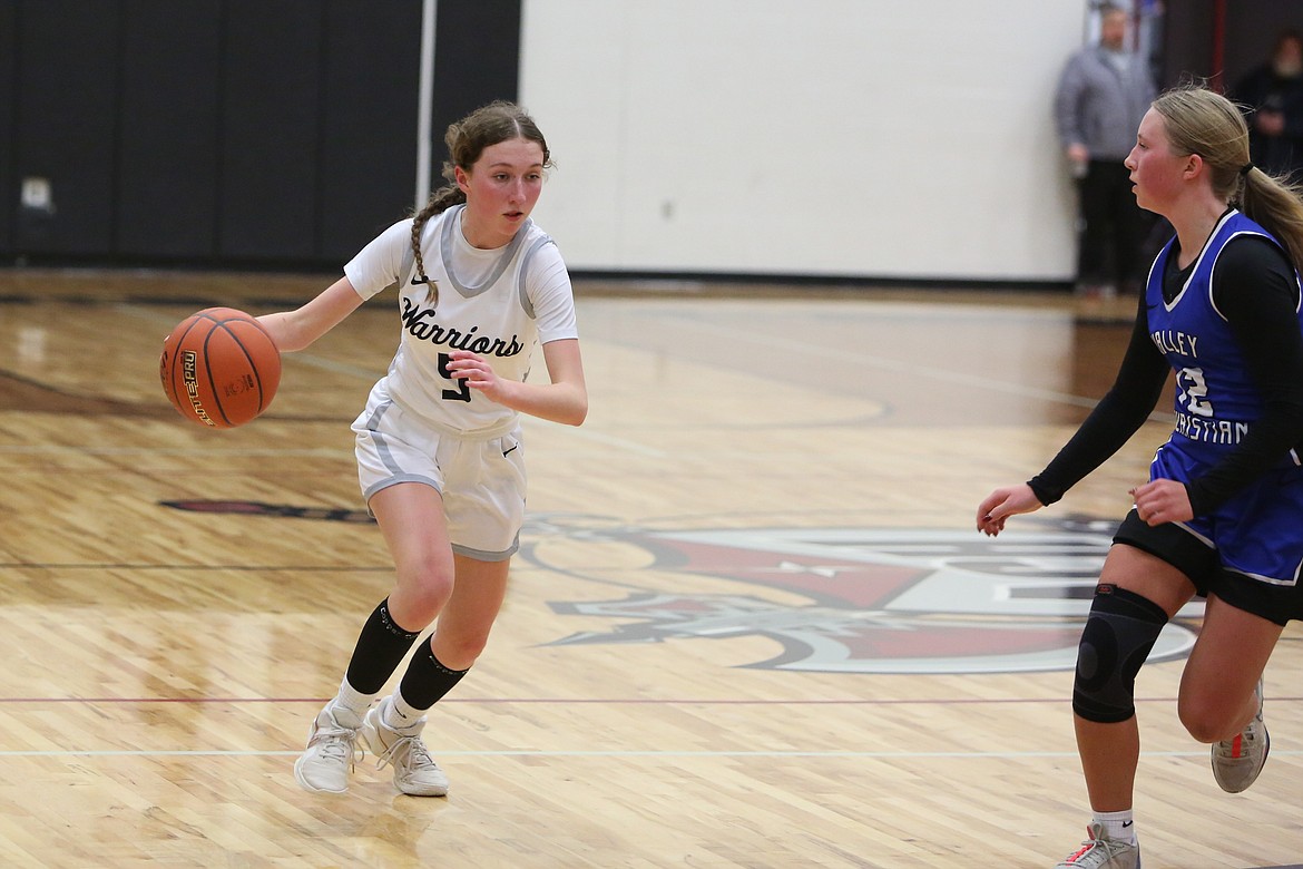 ACH senior Emma Whitaker, left, scored 11 points in Tuesday’s game against Valley Christian.