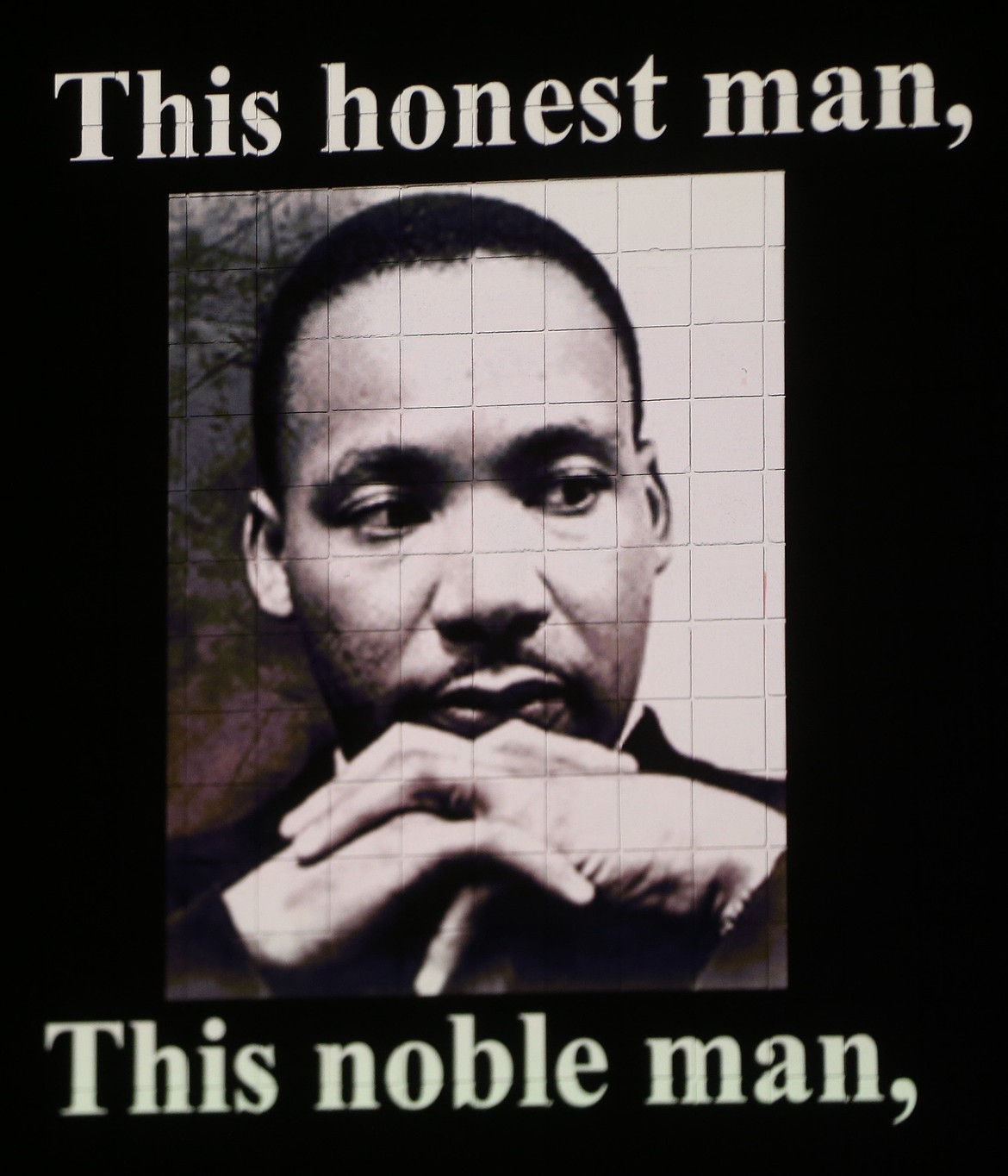 An image of Dr. Martin Luther King Jr. is seen projected onto the wall Thursday morning in Schuler Performing Arts Center at North Idaho College.