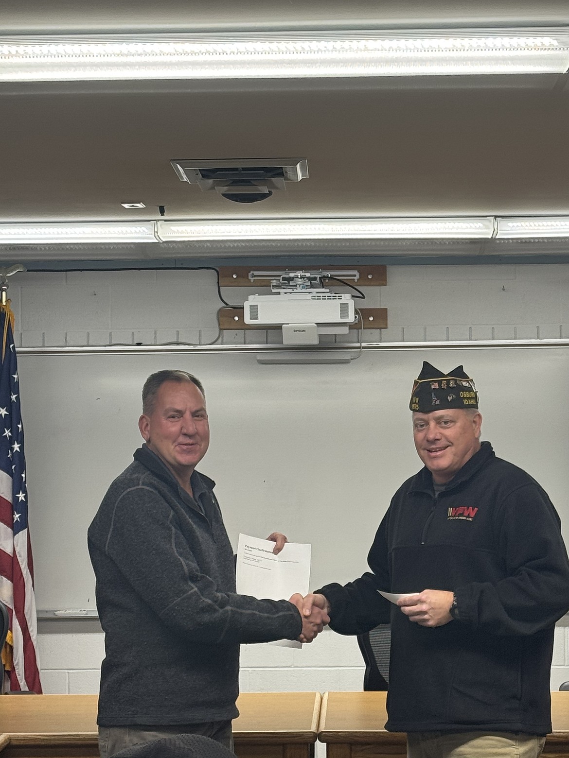 Major Craig Petersen won first place for the Veterans of Foreign Wars Teacher of the Year for the district and the state and was presented an award by VFW Post Cmdr. Chris Marker.