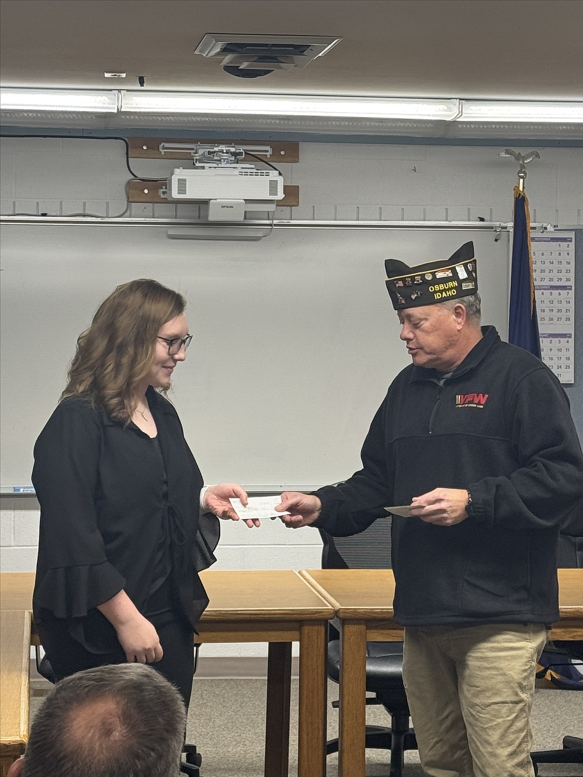 Kellogg student Piper Hendrix won second place in a Voice of Democracy contest through the Veterans of Foreign Wars and was presented her award by VFW Cmdr. Chris Marker.