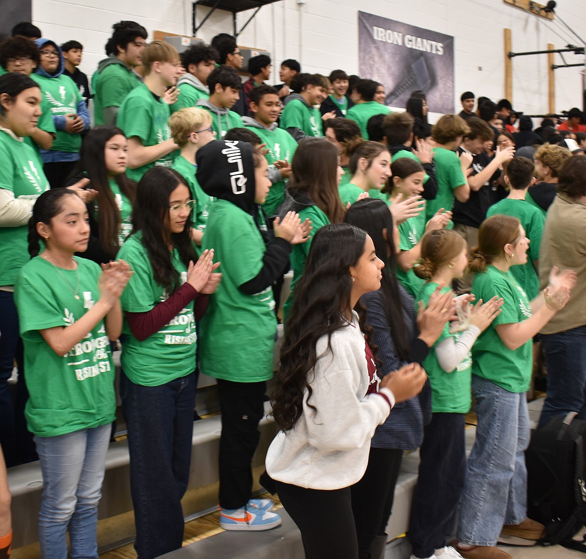 Royal Middle School students applaud classmate Alangel Baeza for his life-saving quick action that saved a fellow student from choking.