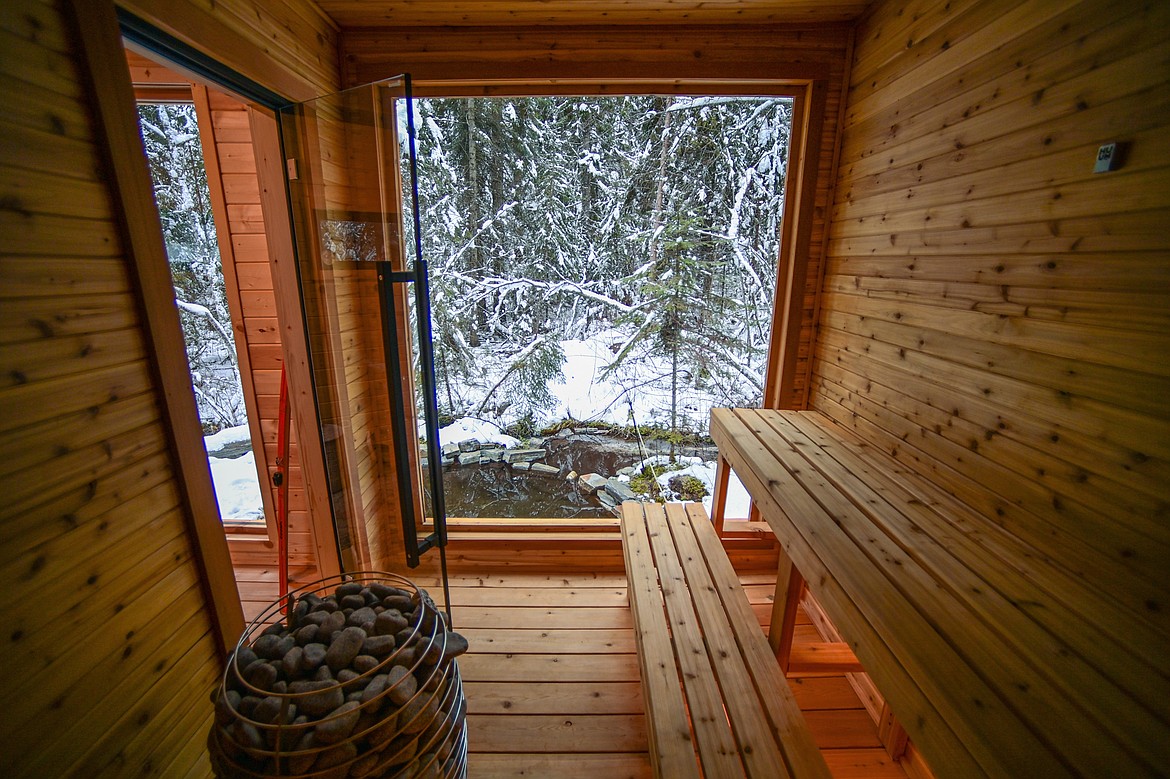 The sauna features a view out over the spring-fed cold plunge pool at The Cabins at Blacktail on Friday, Jan. 17. (Casey Kreider/Daily Inter Lake)