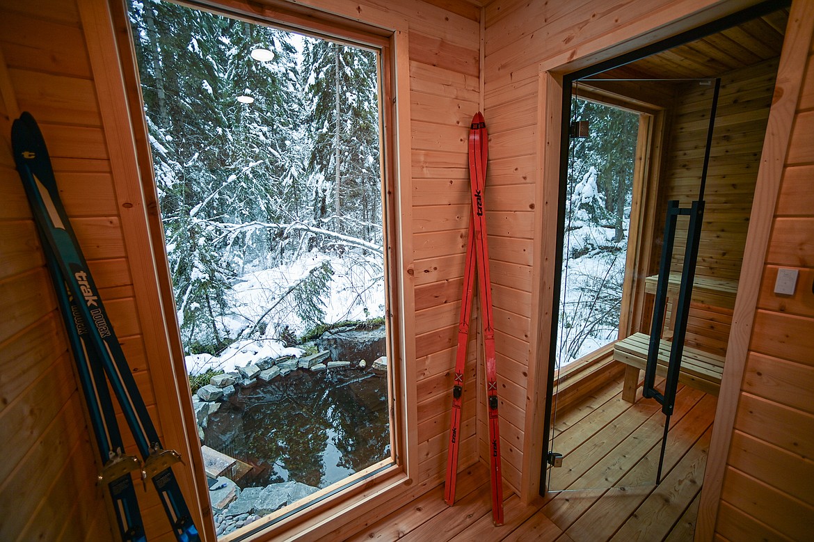 The sauna features a view out over the spring-fed cold plunge pool at The Cabins at Blacktail on Friday, Jan. 17. (Casey Kreider/Daily Inter Lake)