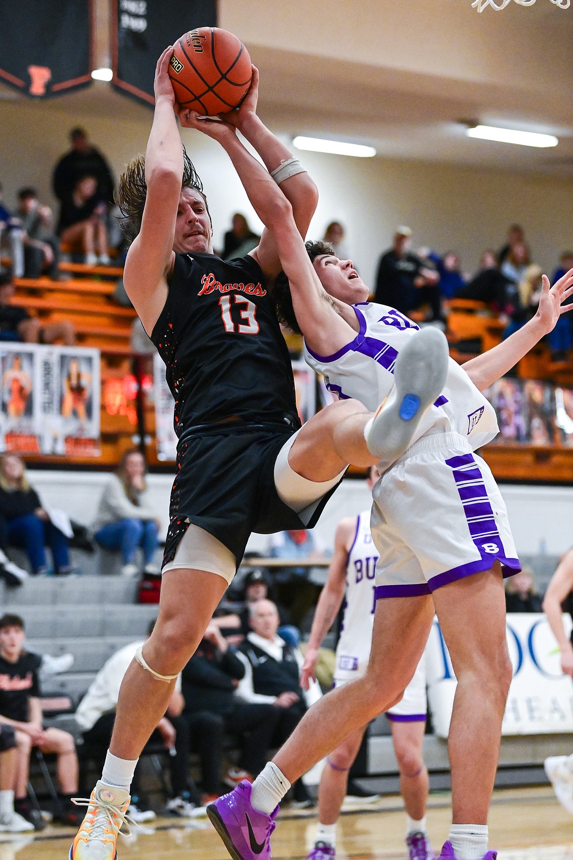 Flathead's Lyric Ersland (13) pulls down a rebound in the third quarter against Butte at Flathead High School on Saturday, Jan. 18. (Casey Kreider/Daily Inter Lake)