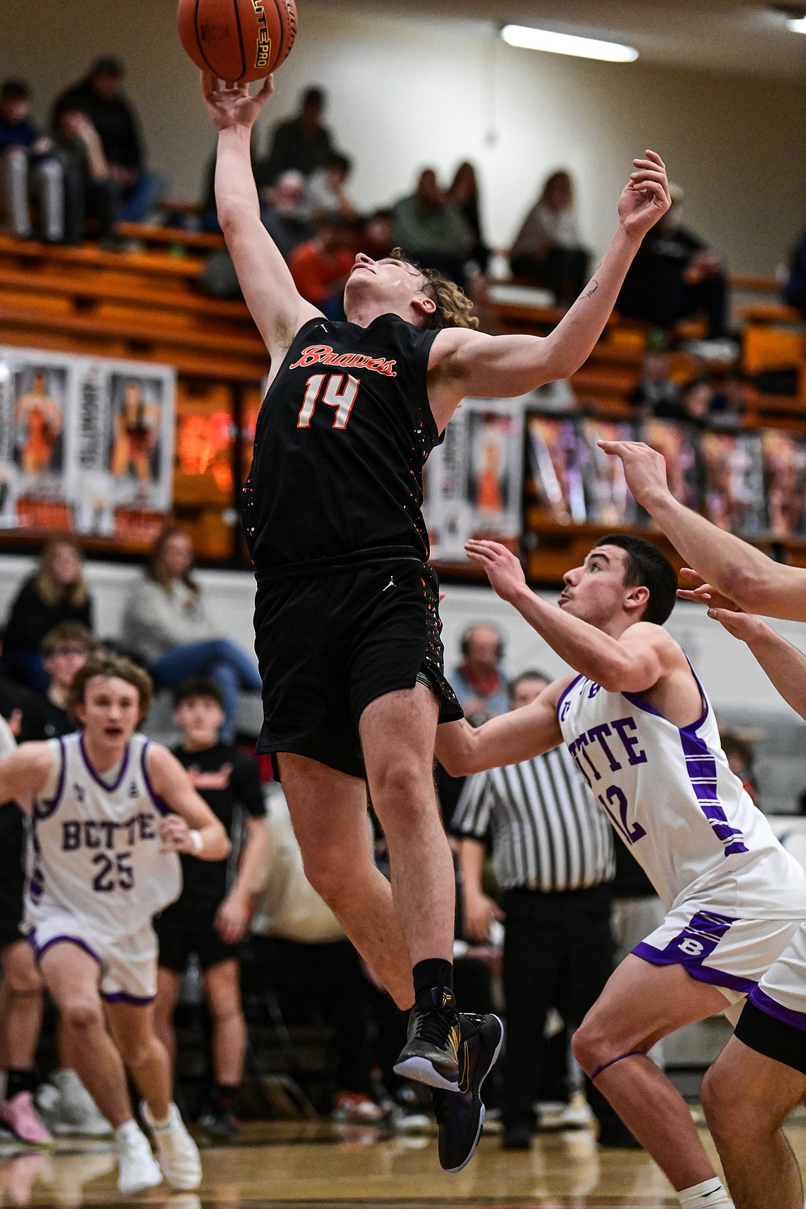 Flathead's Gabe St. Germain (14) pulls down a rebound in the fourth quarter against Butte at Flathead High School on Saturday, Jan. 18. (Casey Kreider/Daily Inter Lake)