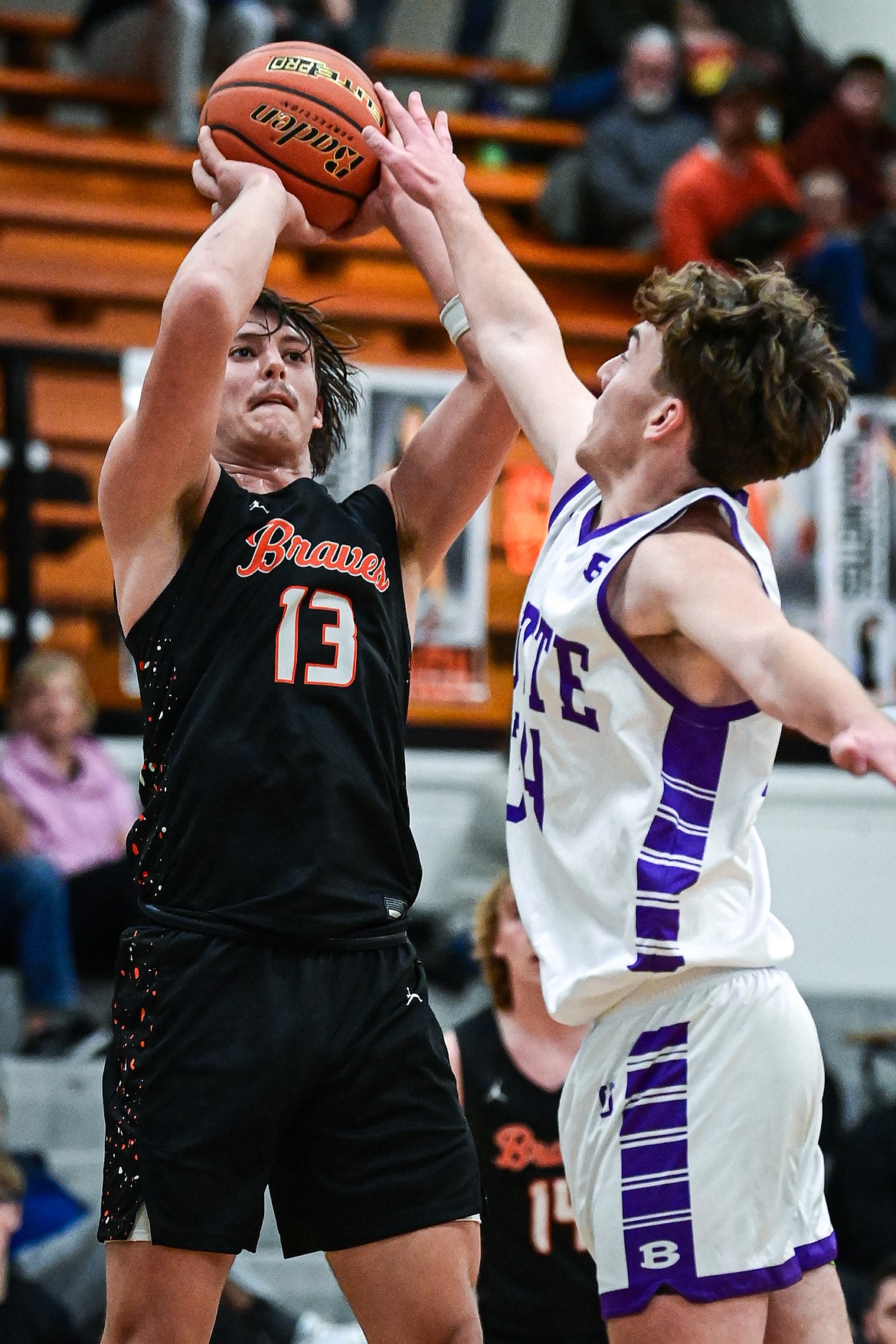 Flathead's Lyric Ersland (13) knocks down a jumper in the fourth quarter against Butte at Flathead High School on Saturday, Jan. 18. (Casey Kreider/Daily Inter Lake)