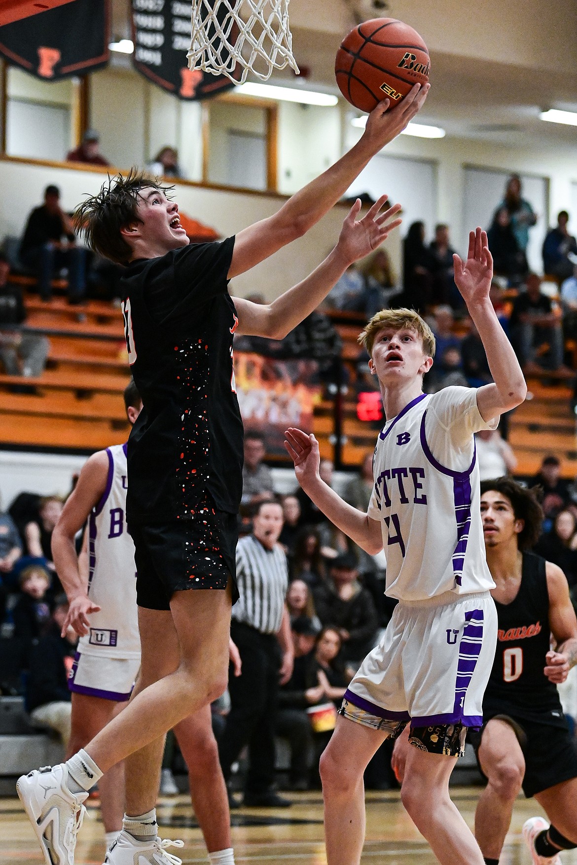 Flathead's Noah Sonju (23) goes to the basket in the second quarter against Butte at Flathead High School on Saturday, Jan. 18. (Casey Kreider/Daily Inter Lake)