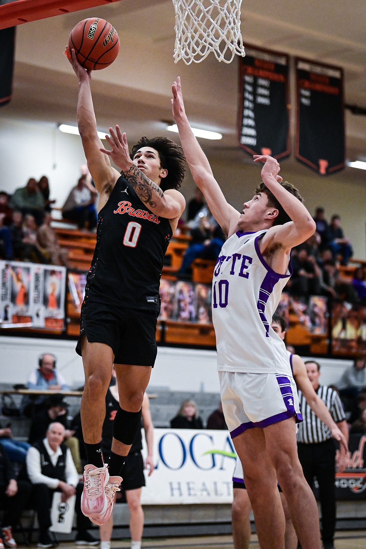 Flathead's Jordan Griffin (0) drives to the basket in the fourth quarter against Butte at Flathead High School on Saturday, Jan. 18. (Casey Kreider/Daily Inter Lake)