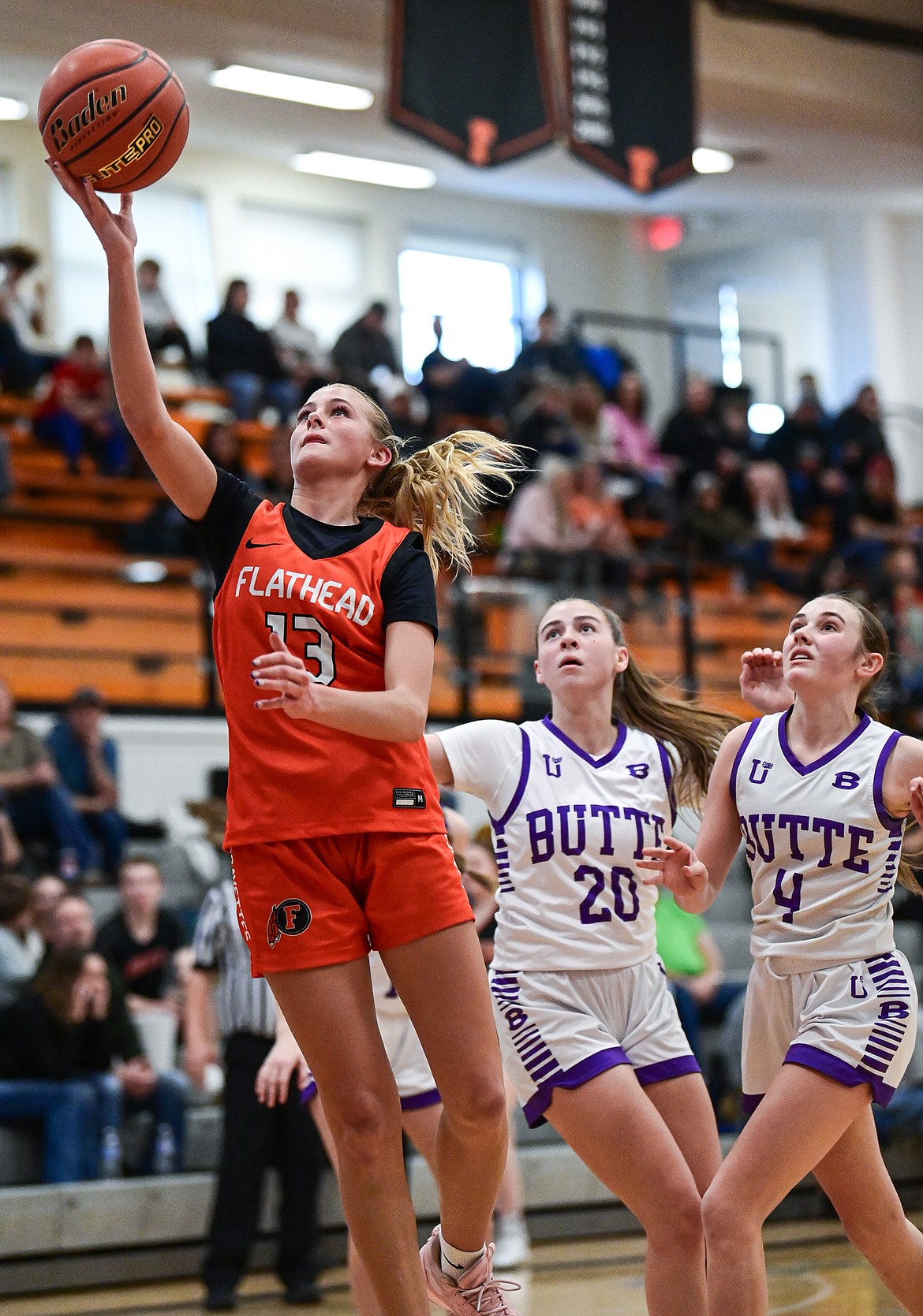 Flathead's Caitlin Converse (13) drives to the basket in the second quarter against Butte at Flathead High School on Saturday, Jan. 18. (Casey Kreider/Daily Inter Lake)