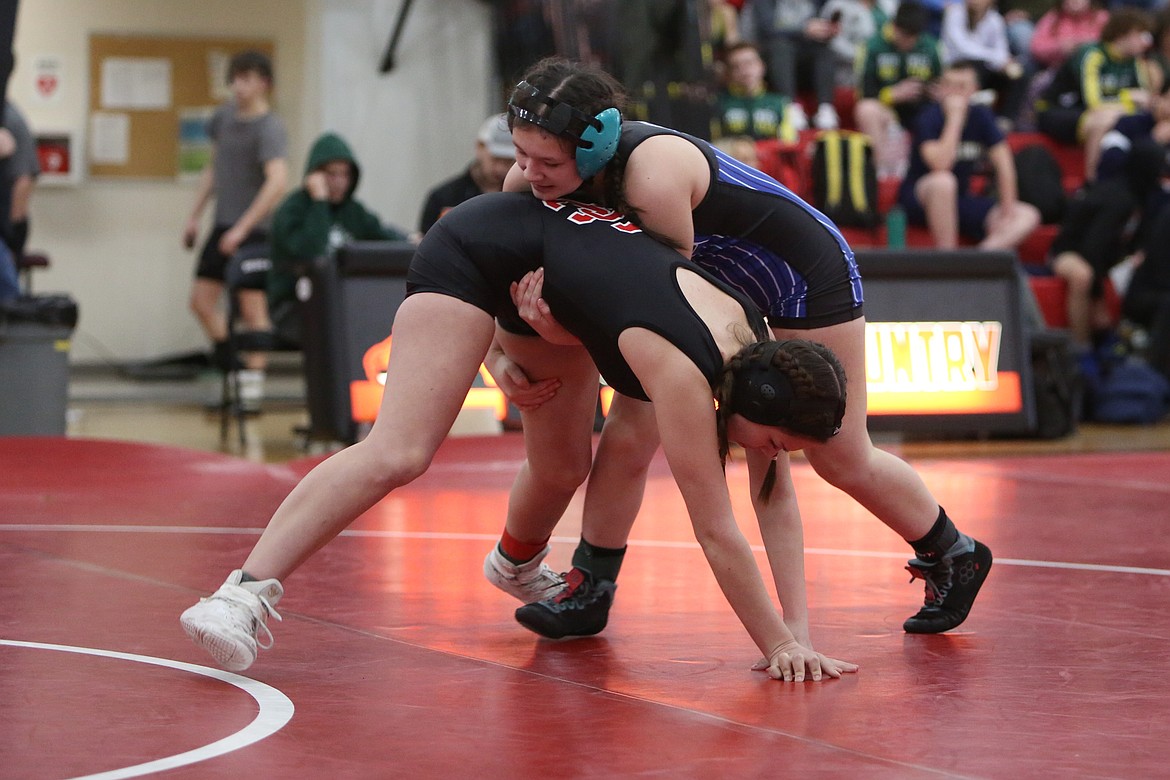 Wrestlers from Wilbur-Creston-Keller and Mary Walker battle at the Bronco Invite in Ritzville on Saturday.