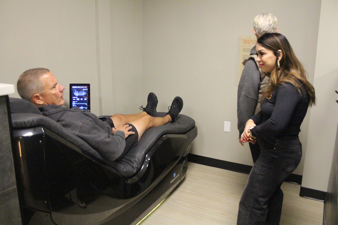 A customer tries out the cryo-chair at the new Pillar Fitness in Othello.