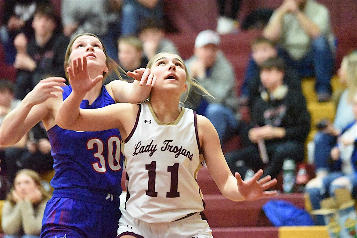 Troy junior Brooklynn Reid battles for rebounding position against Superior's Makenzie Reum in a game Friday, Jan. 17, 2024, against Superior. (Scott Shindledecker/The Western News)