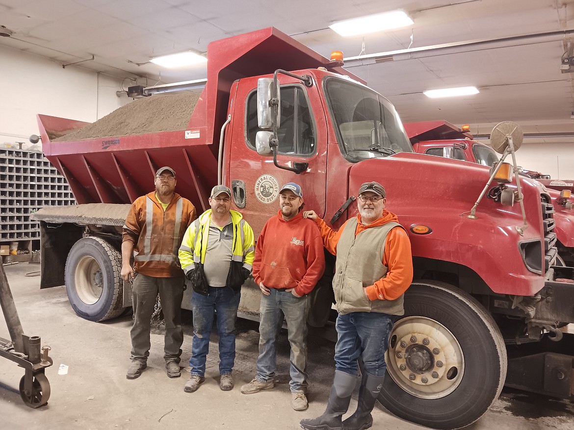 From left, Mineral County snowplow drivers Terry Erickson, Jeff Mask, Nick Ostle and Road Supervisor Jason McLees inside their shop in Superior. Missing is Luke Boyce who completes the team of drivers that plow and sand the county roads and parking lots each winter. (Monte Turner/Mineral Independent)