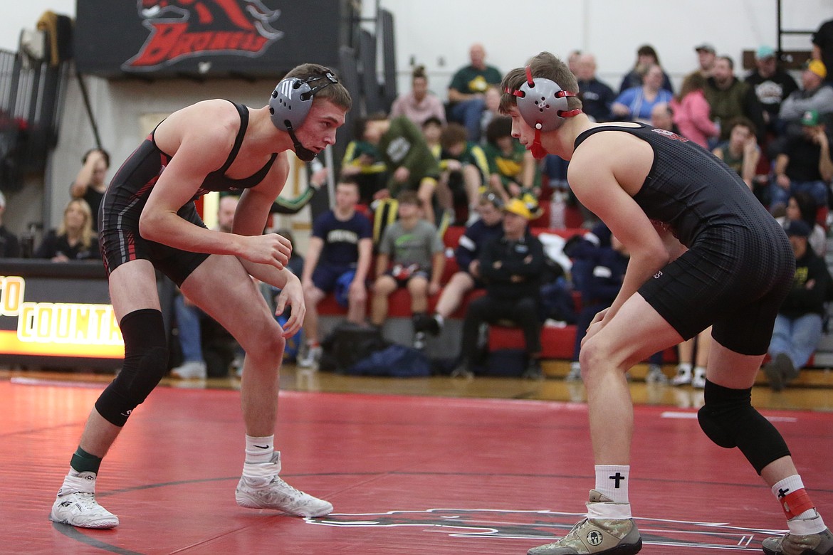 Almira/Coulee-Hartline freshman Aaden Baergen, left, placed third in the 138-pound weight class at Saturday’s Bronco Invite.