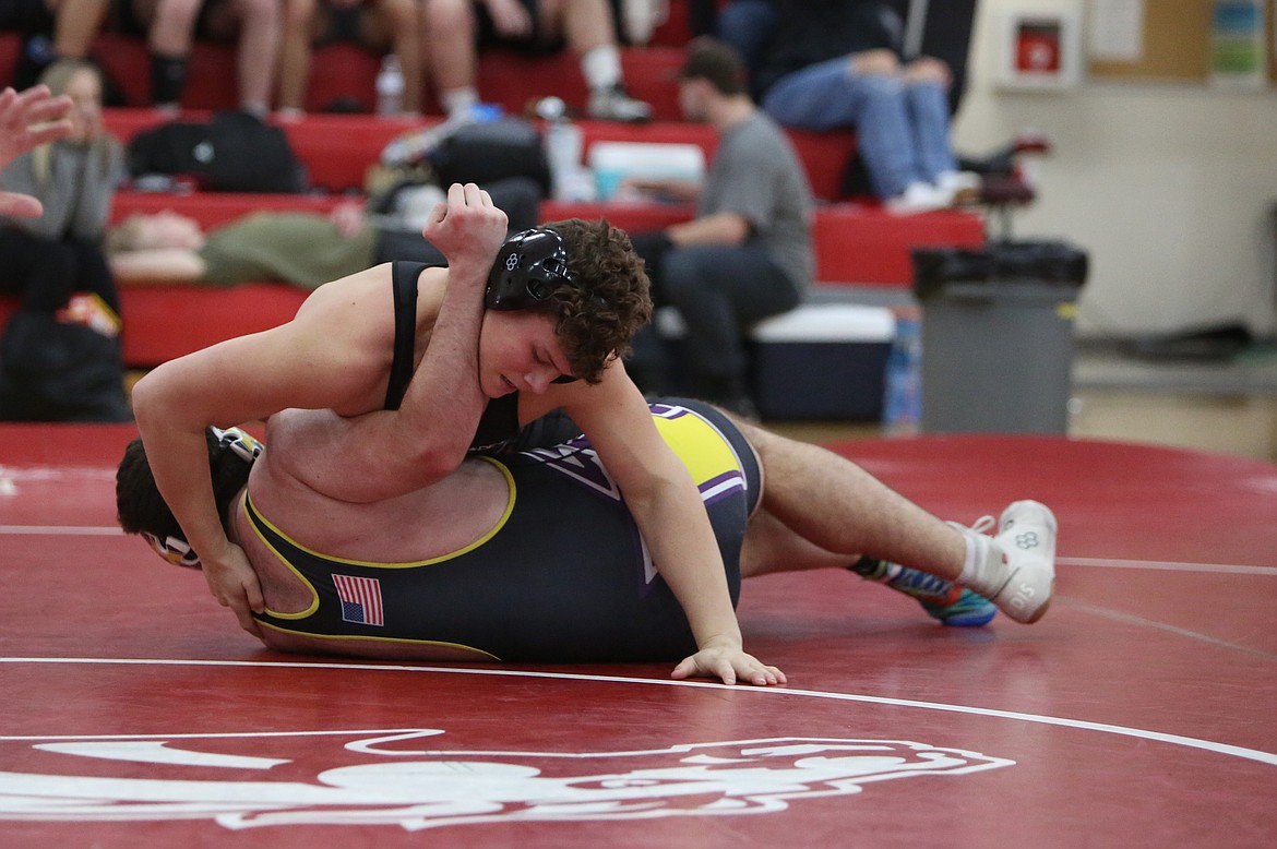 ACH sophomore Noah Butler, top, placed first in the 215-pound weight class of the Bronco Invite.