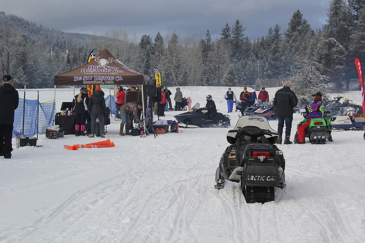 The timed event on Saturday wasn’t only for vintage snowmobiles, but every make, model and year to see just how fast they could complete the salmon course in the huge field west of the parking lot of the $50,000 Bar. (Monte Turner/Mineral Independent)