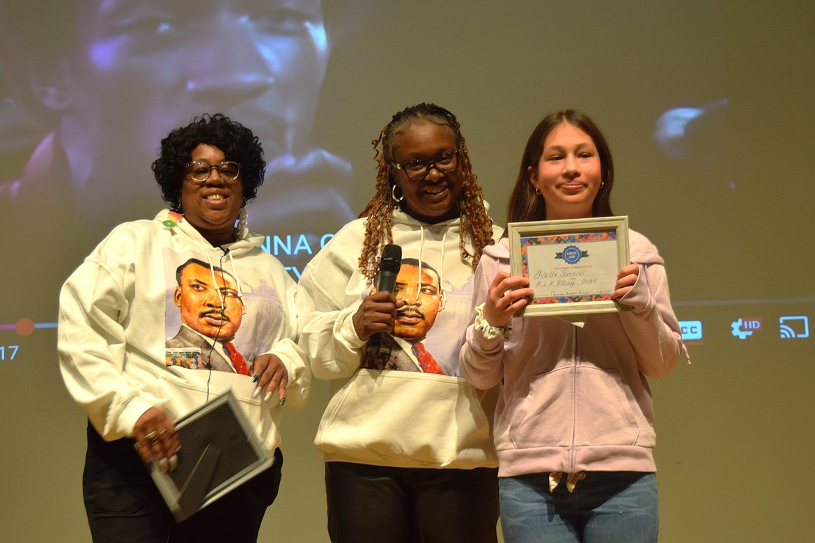 The second-place recipient for the Martin Luther King Jr. Essay Contest was Giselle Serrano, right. Moses Lake Martin Luther King Jr. Committee Vice President LaDonna Richie, left, and Moses Lake Martin Luther King Jr. Committee President Miranda Bridges-Lindsey, middle, presented the award to Serrano.