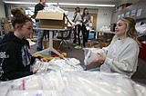 River City Middle School students prep care packages for cancer patients