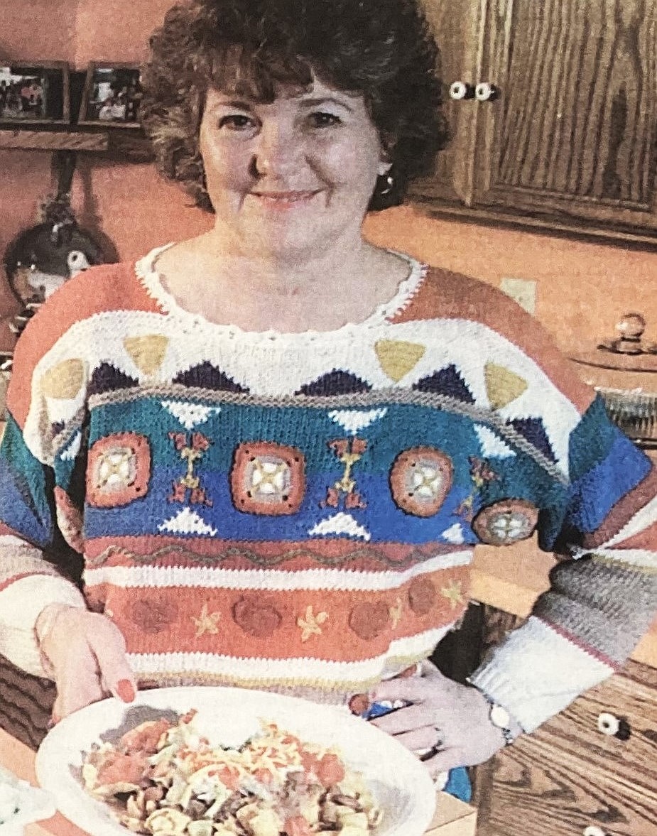 In 1995, Mary Jo Friesz shows off son John’s favorite Super Bowl dish, “Quarterback Stew.”