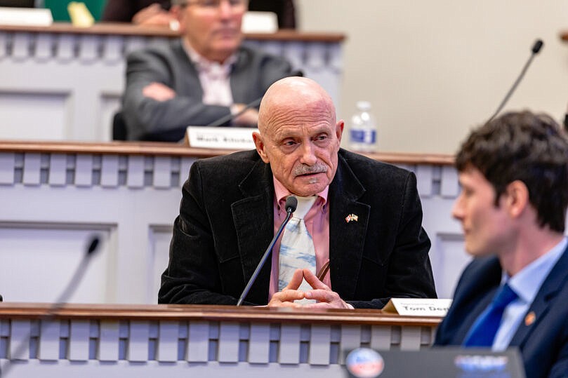 Rep. Tom Dent, R-Moses Lake, speaks with an attendee of a Transportation Committee hearing this session. Dent is on various committees this year.