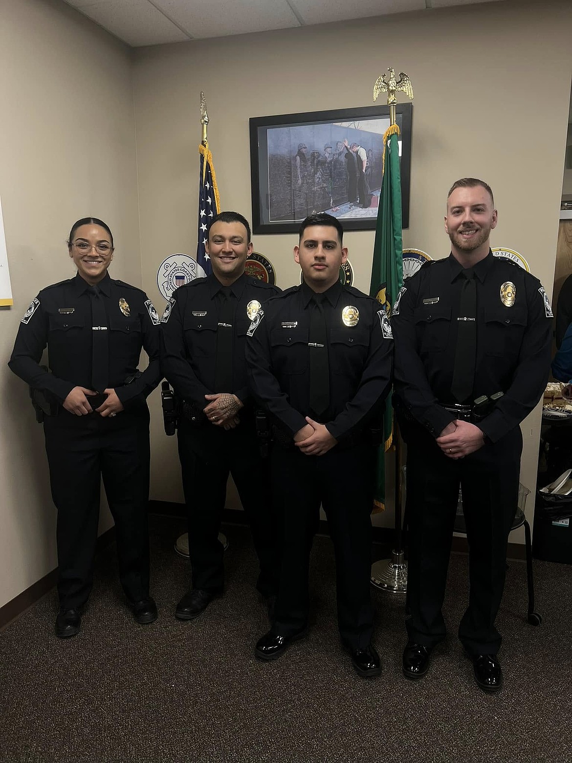 From left: Danya Mercado, Diego Hernandez, Mark Gomez Paz and William Halterman were sworn in Tuesday as Quincy Police Department officers.