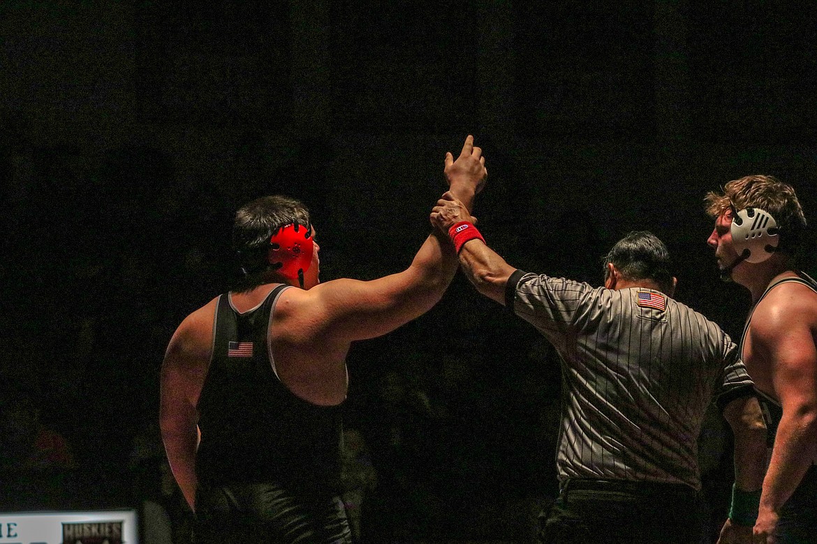 Othello senior Mason Perez, left, won by a second-round pin at Wednesday’s dual against Selah. Perez was one of eight Huskies who pinned their opponents at the dual.