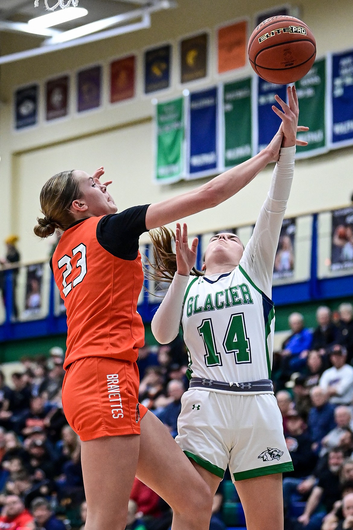 Flathead's Grace Gall (23) blocks a shot by Glacier's Karley Allen (14) in the second half at Glacier High School on Friday, Jan. 24. (Casey Kreider/Daily Inter Lake)