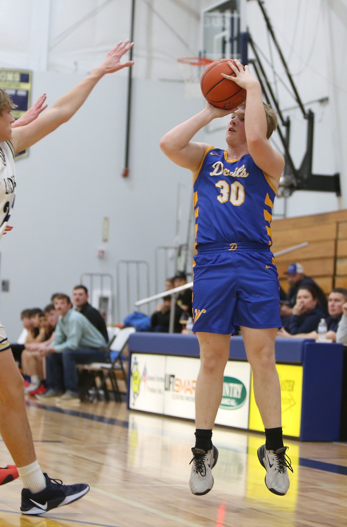 Wilson Creek senior Owen Lewison attempts a three-pointer in the first quarter against MLCA/CCS on Thursday.