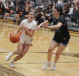 PREP GIRLS BASKETBALL: Vikings start fast, down Trojans