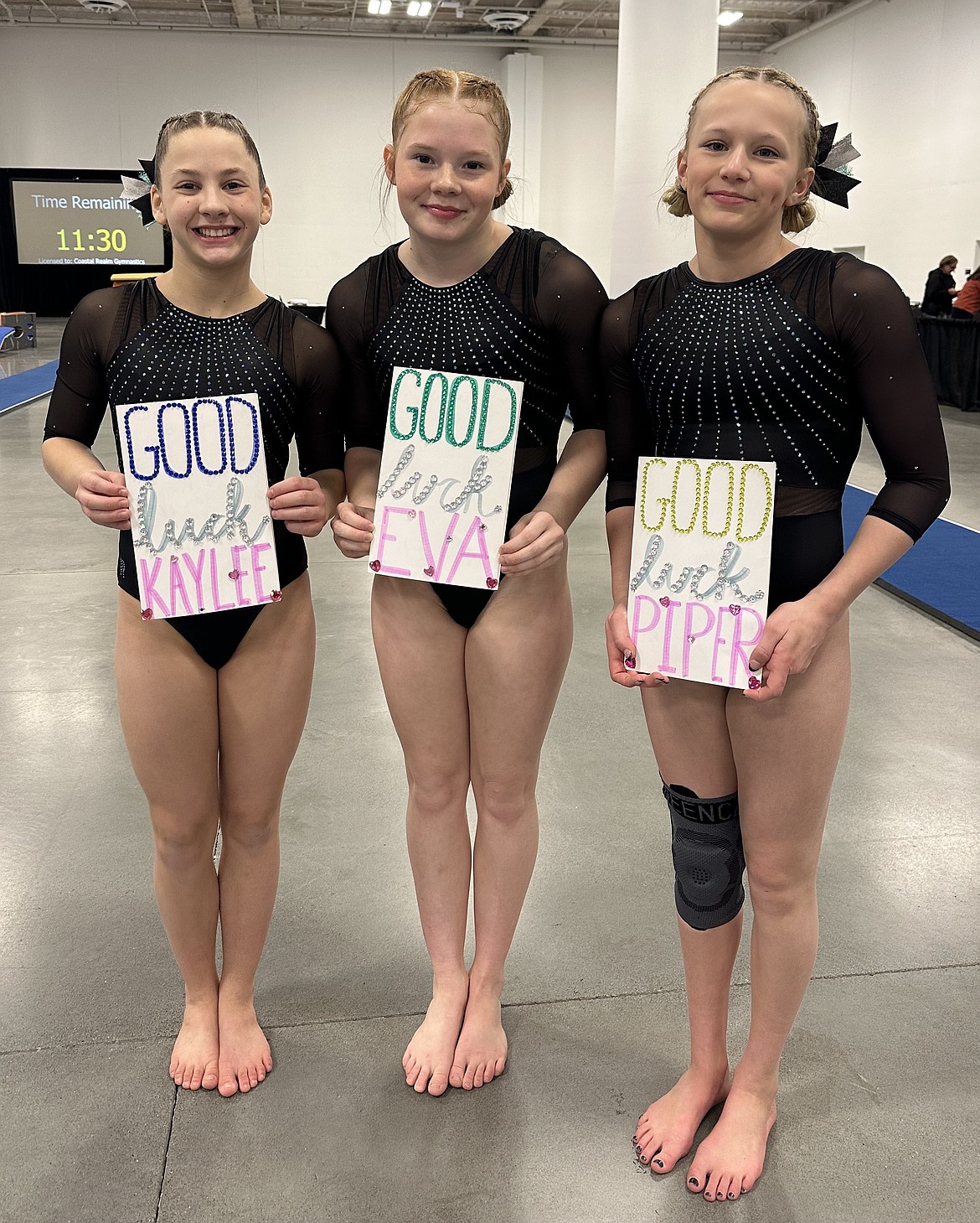 Courtesy photo
Avant Coeur Gymnastics had three athletes compete in the Hopes Compulsory Elite Qualifier at the Next Era Meet in Seattle. From left are Kaylee Strimback, Eva Martin and Piper St John.