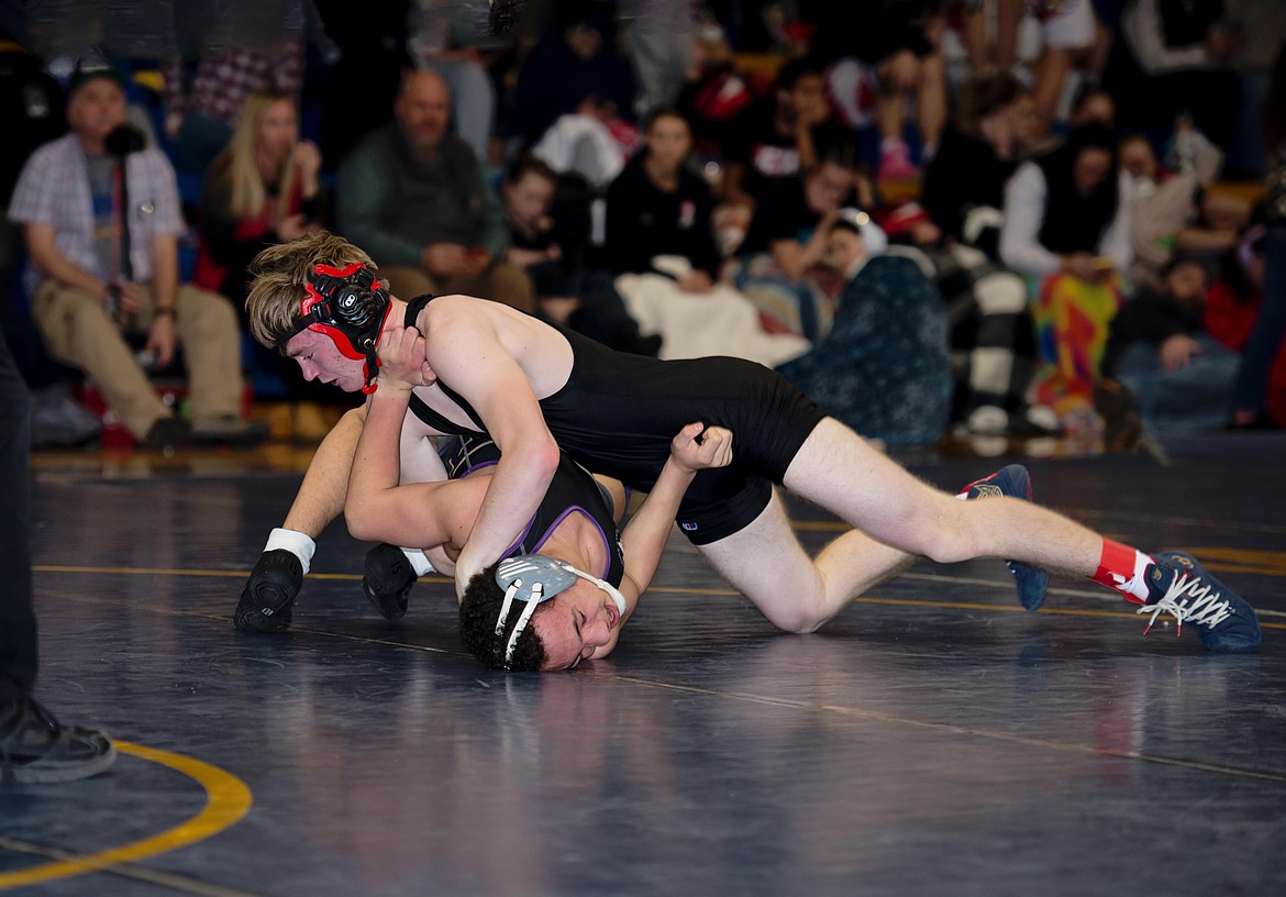 John Waterbury closes in on a pin at the 157-pound classification in this past weekend's Ted Kato Memorial wrestling event in Thompson Falls. (Photo by Teresa Waterbury)