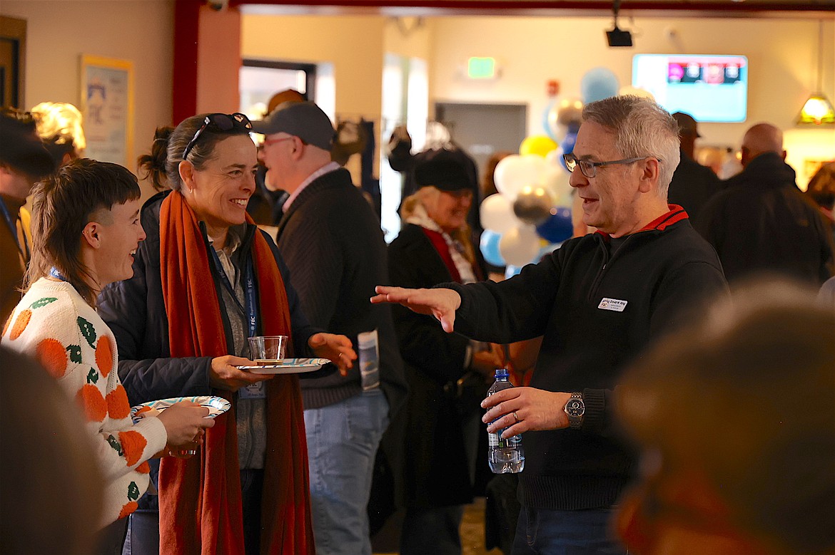 Flathead Lake International Cinemafest founder David King visits with film fans in the lobby of the Showboat Cinema during last year's festival.