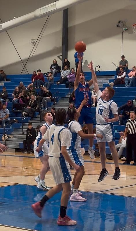 Bobcats senior Tritzen Avila goes up high for a shot versus St. Ignatius in their game this past week in St. Ignatius.  (Superior staff photo)