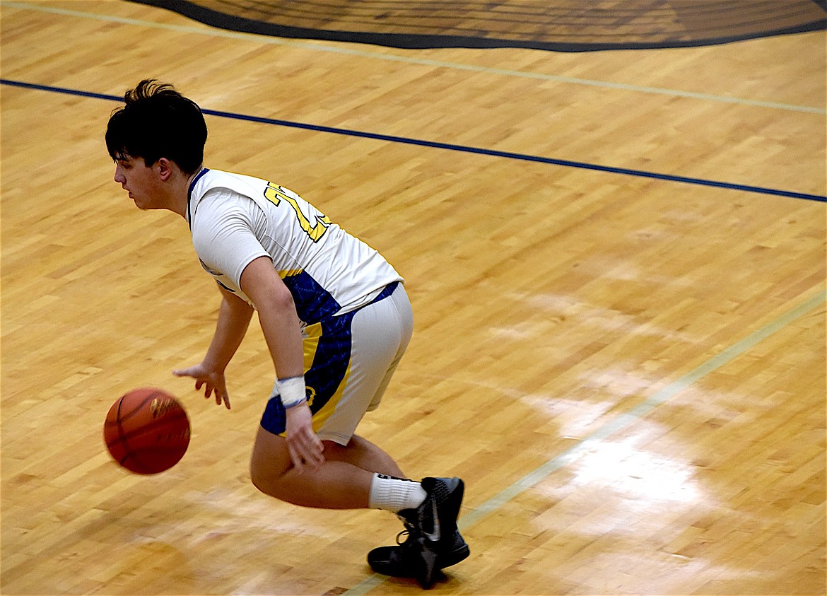 Libby's Isaac Lamere drives to the basket Saturday, Jan. 25, 2025, against Polson. (Scott Shindledecker/The Western News)