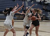 PREP GIRLS BASKETBALL: Coeur d'Alene caps unbeaten IEL slate, downs Lakeland