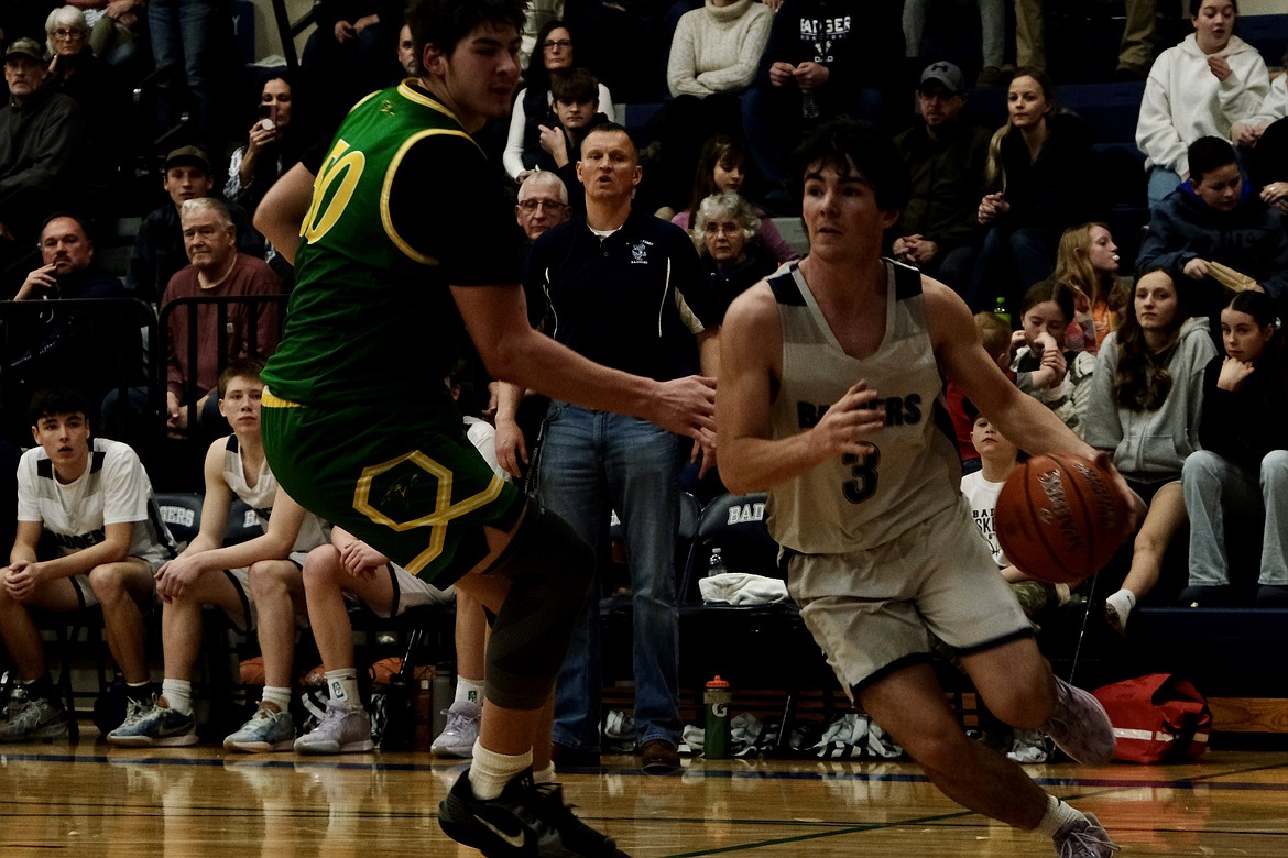 Eli Blackmore drives down the baseline against Lakeland.