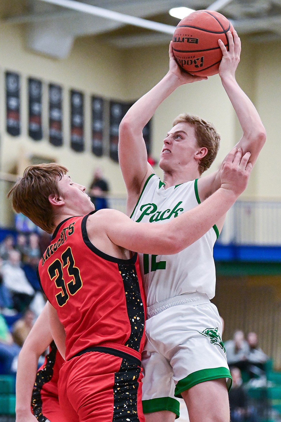 Glacier's Luke Nikunen (12) drives to the basket in the first half against Missoula Hellgate at Glacier High School on Thursday, Jan. 30. (Casey Kreider/Daily Inter Lake)