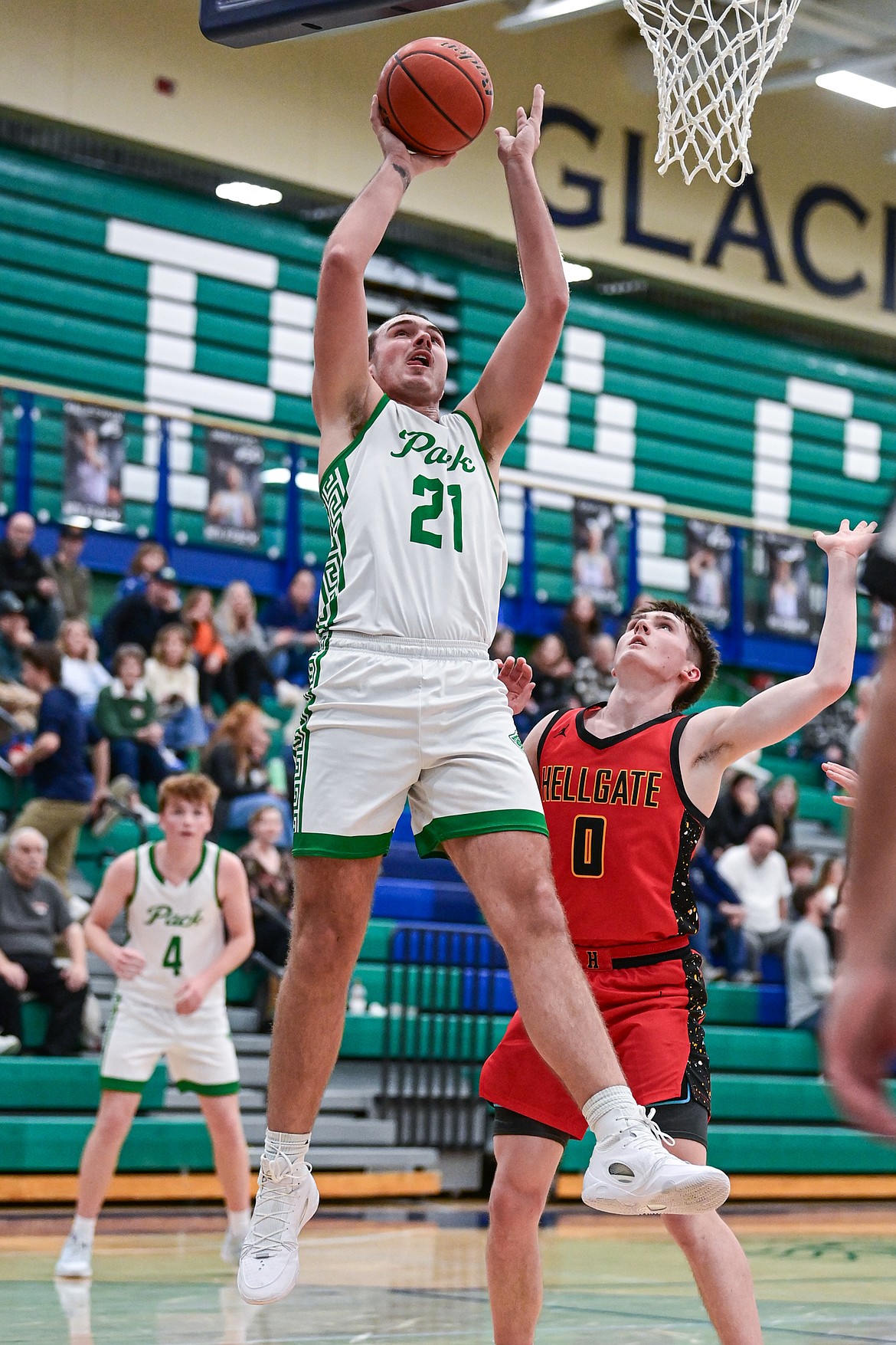 Glacier's Slate Burrington (21) goes to the basket in the first half against Missoula Hellgate at Glacier High School on Thursday, Jan. 30. (Casey Kreider/Daily Inter Lake)