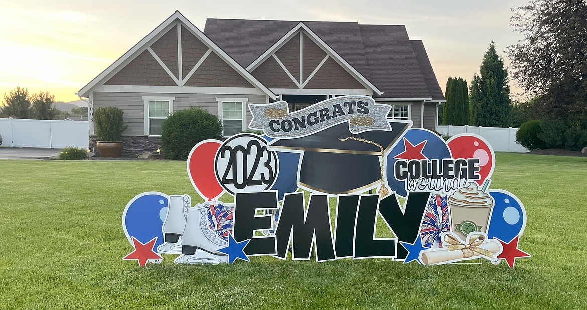 A custom graduation sign, designed by Elise Smith.
