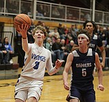 PREP BOYS BASKETBALL: Coeur d'Alene falls in Brown's interim opener